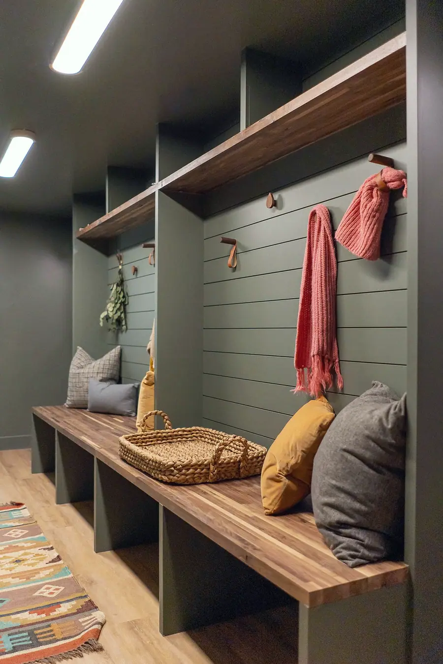 6468 S Brookstone mudroom with sage lockers, wood bench, and woven basket