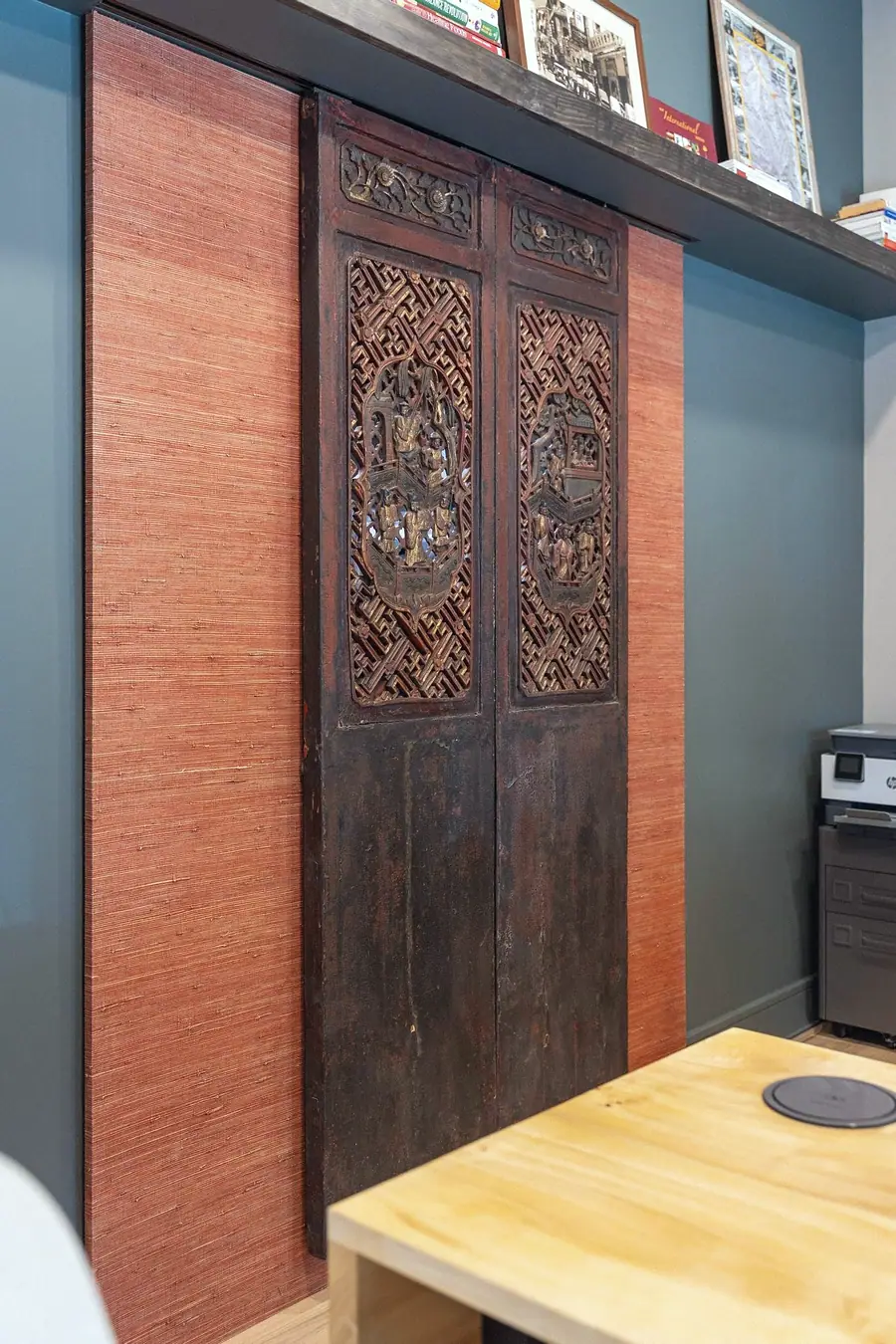 Elysium antique carved wood doors with woven panel and teal wall