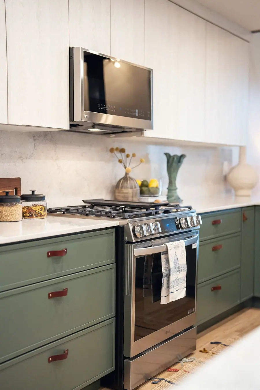 6468 S Brookstone kitchen range wall with sage cabinets and stainless appliances
