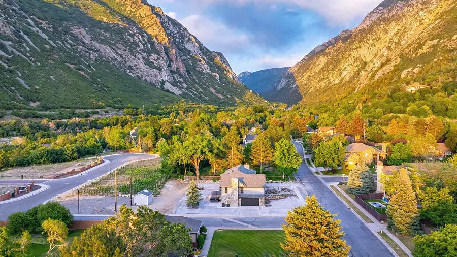 Aerial view of Little Gem nestled in Little Cottonwood Canyon at golden hour