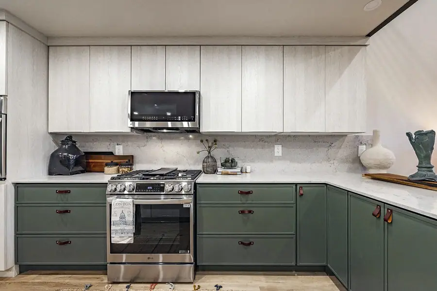 6468 S Brookstone kitchen range wall with sage lower cabinets and light oak uppers