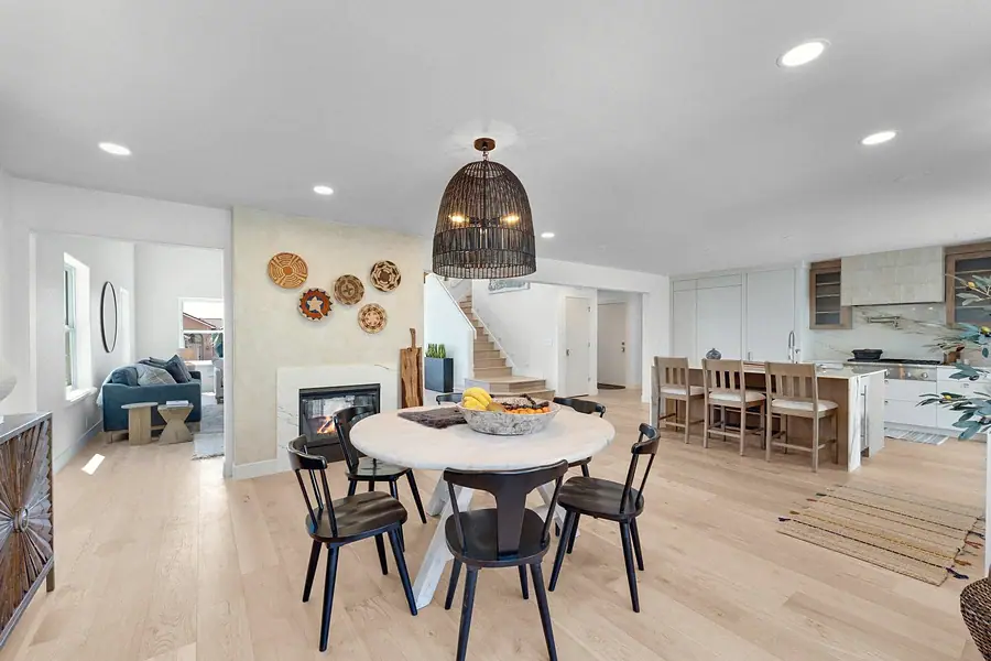 Grand Vista open dining, kitchen island, and living spaces