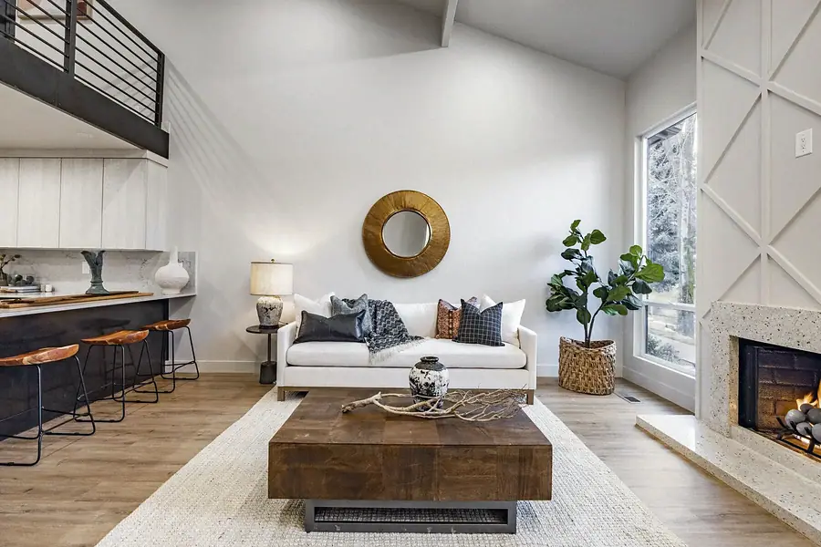 6468 S Brookstone loft overlook with cable rail, living room, and kitchen beyond